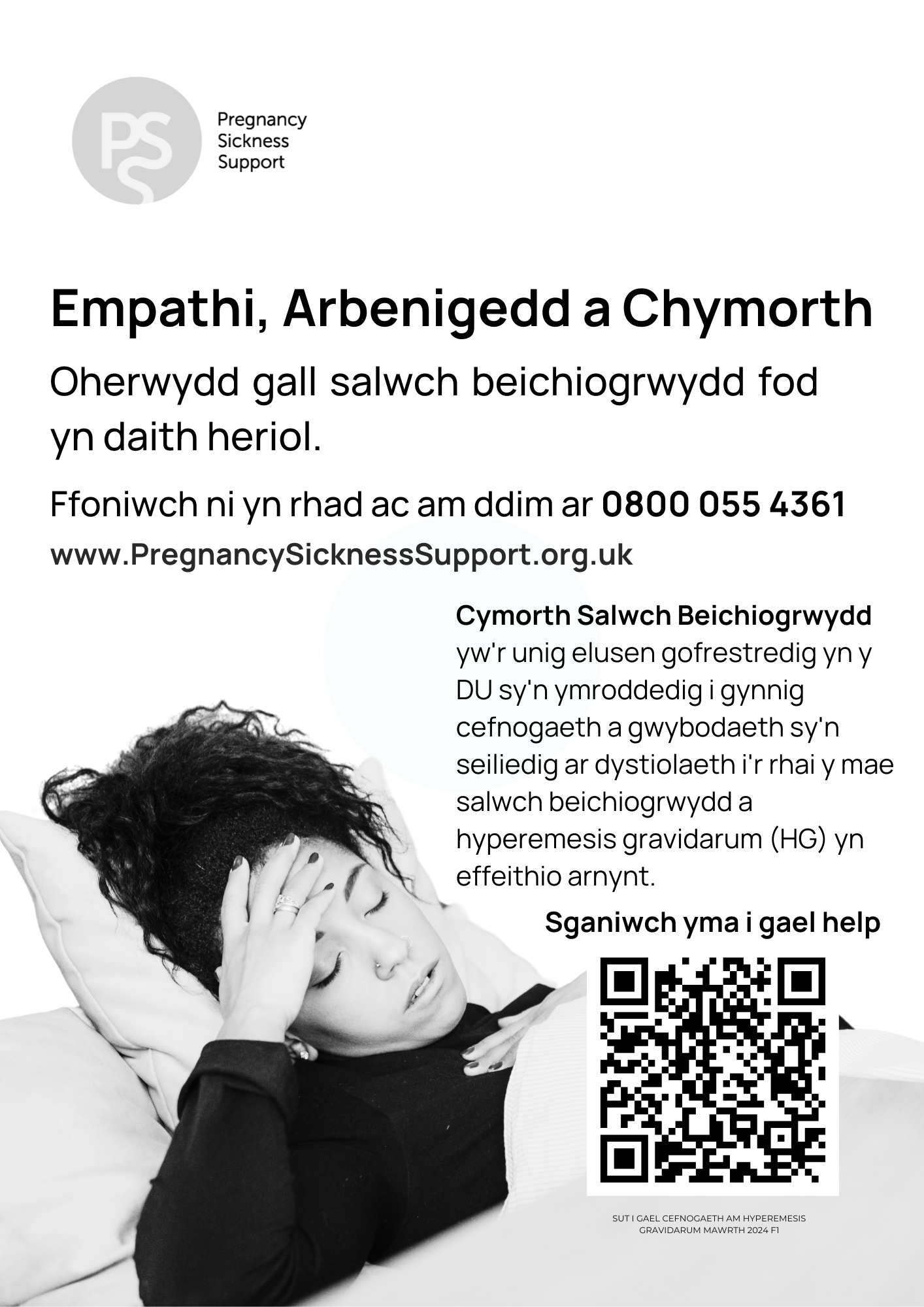 2 Woman holding her fundraising shirt smiling